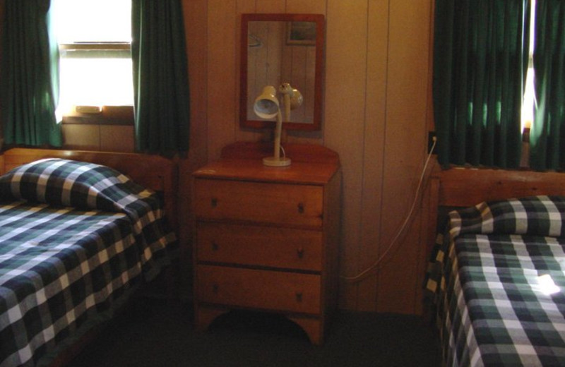 Cabin bedroom at Pipestone Point Resort.