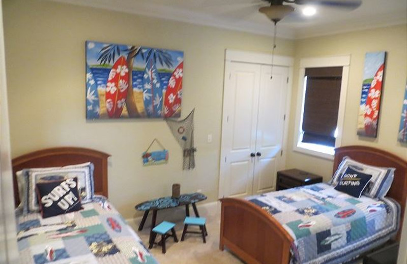 Rental bedroom at Aqua Vacations and Sales Group.