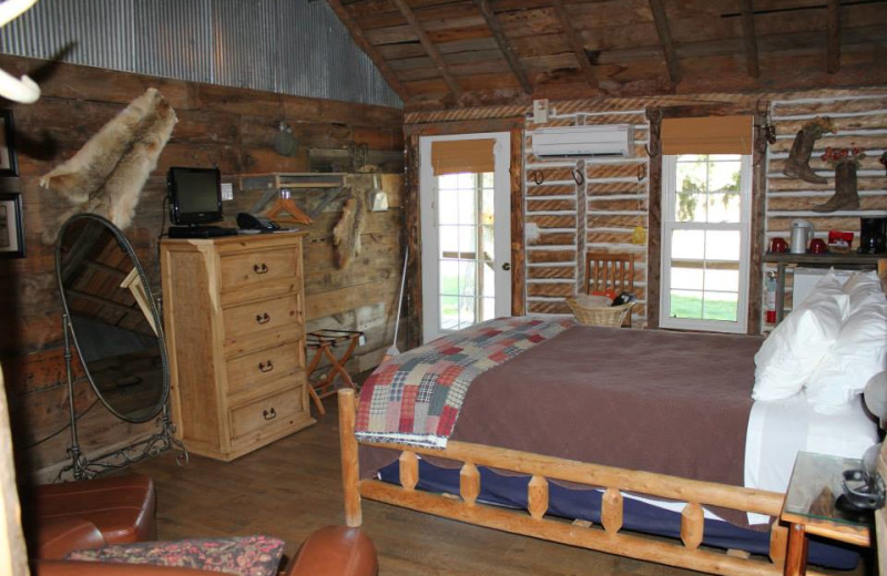 Cabin bedroom at Colorado Cattle Company Ranch.