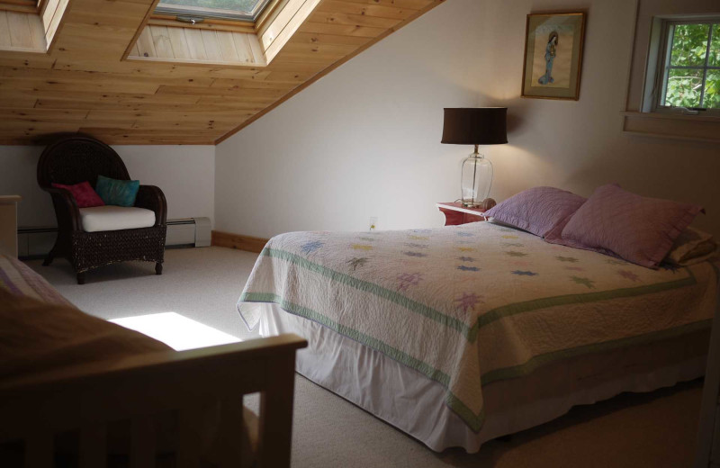 Rental bedroom at Acadia Cottage Rentals.