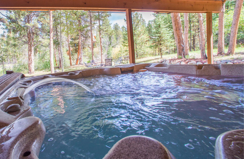 Vacation rental hot tub at Key To The Rockies Lodging Company.