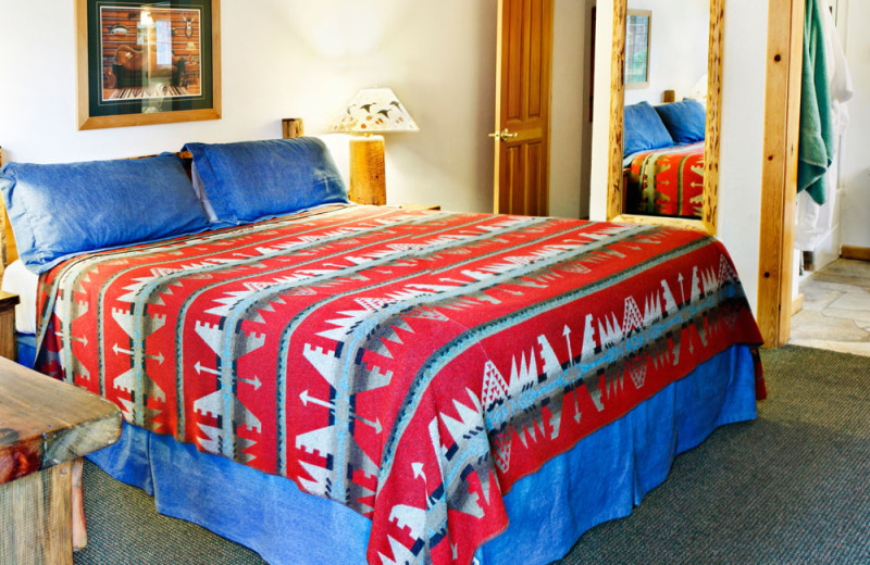 Master Bedroom of a One Bedroom Unit at the Red Wolf Lakeside Lodge