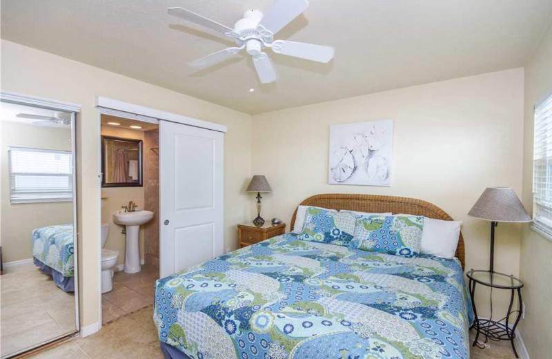 Rental bedroom at Surf Song Resort Condominiums.