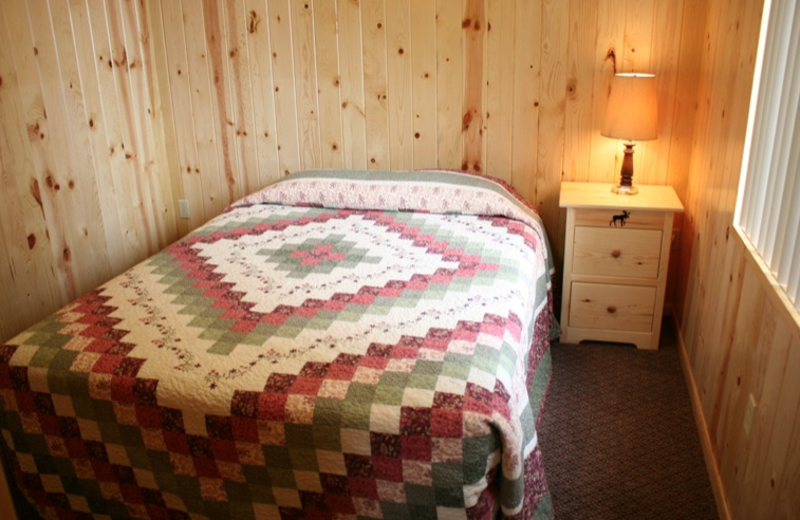 Cottage bedroom at Shady Grove Resort.