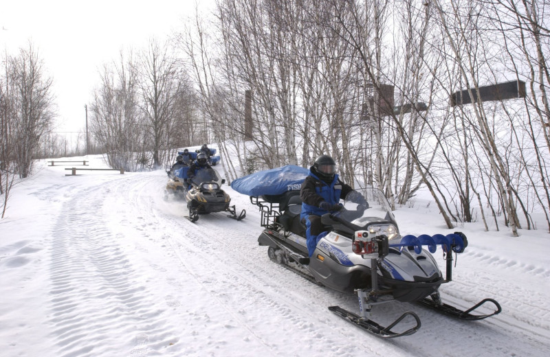 Snowmobiling at Grand Ely Lodge.