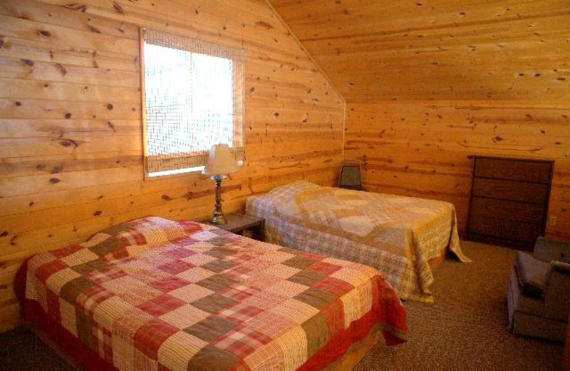 Cabin bedroom at Chase's Ethel Beach Resort.