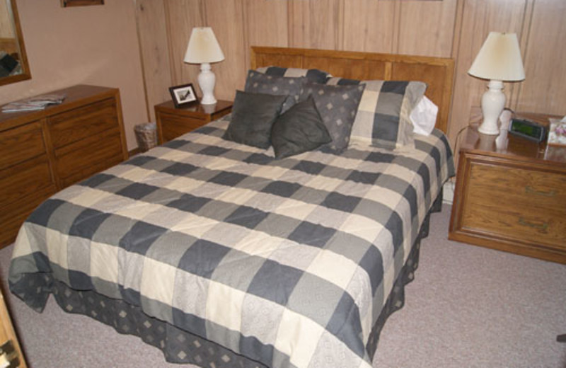 Vacation rental bedroom at Snowshoe Properties Management.