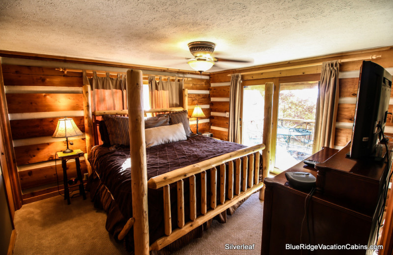 Cabin bedroom at Blue Ridge Vacation Cabins. 