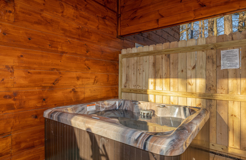 Jacuzzi at American Patriot Getaways - Bessy Bears Cabin.