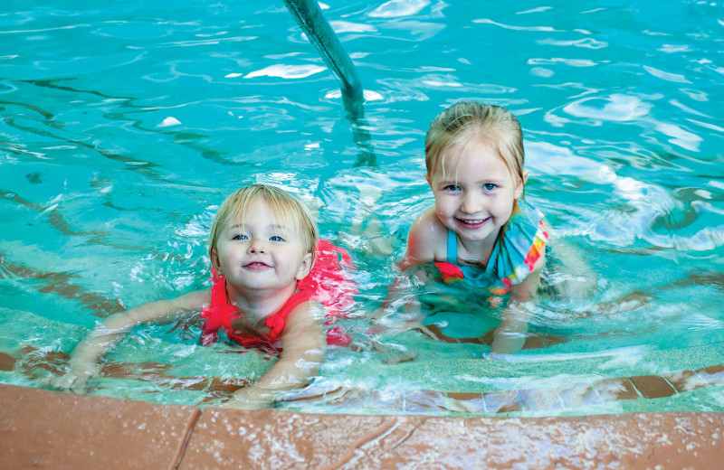 Kids in pool at Caribe Resort.