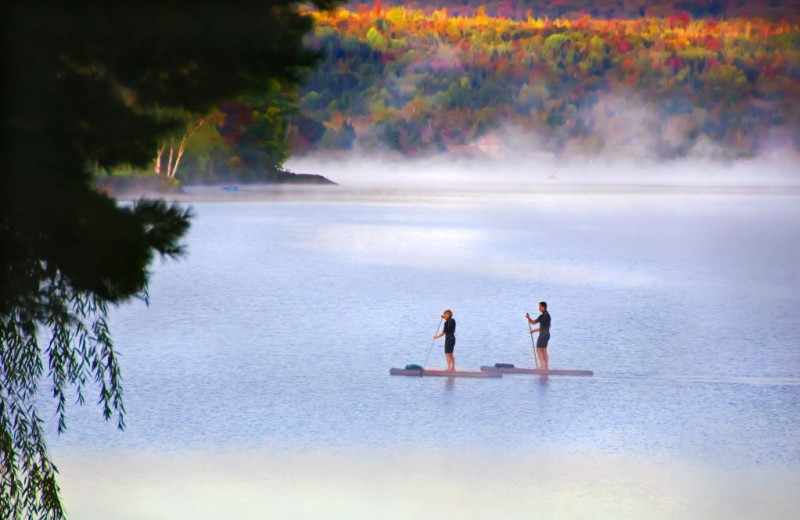 Paddle boarding at Jackson's Lodge and Log Cabins.