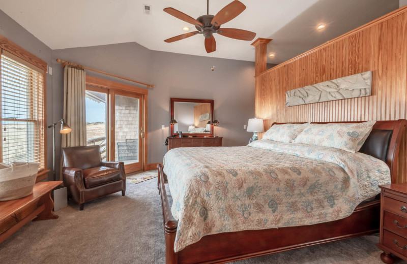 Rental bedroom at Joe Lamb Jr. & Associates Vacation Rentals.