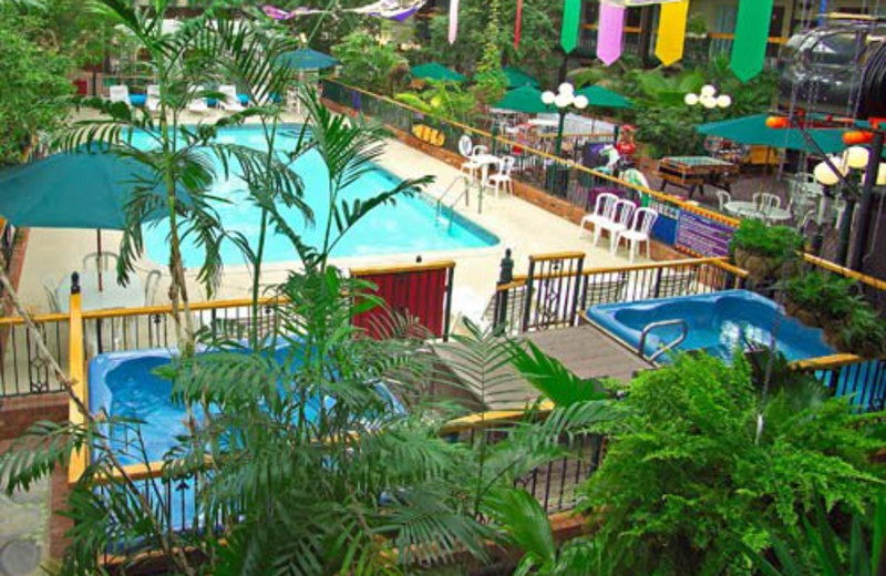 Tropical courtyard pool area at Cairn Croft Best Western Plus Hotel.