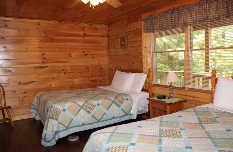 Cabin bedroom at Country Road Cabins.