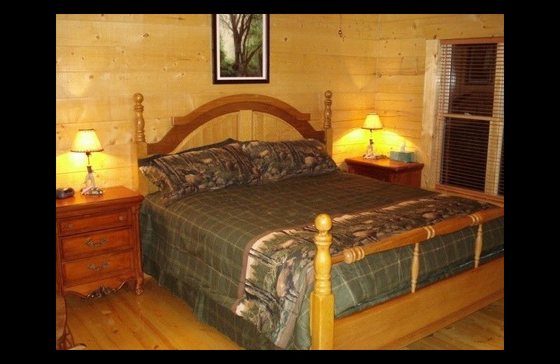 Cabin bedroom at Pine Ridge Log Cabins.