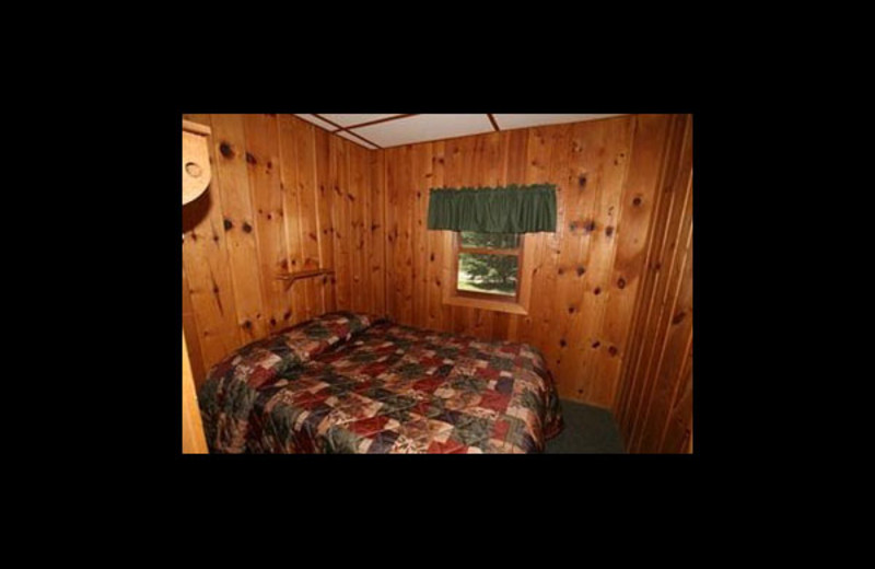 Cabin bedroom at Broadwater Lodge.