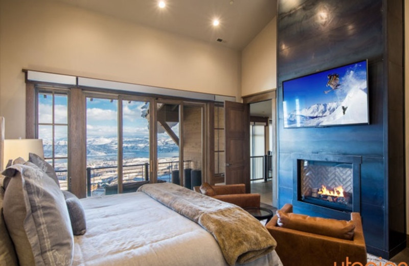 Rental bedroom at Utopian Luxury Vacation Homes.