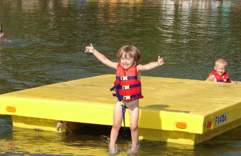 Jumping into the lake at Train Bell Resort.