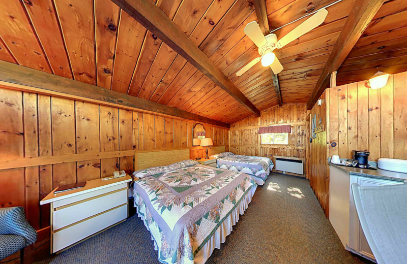 Cabin bedroom at Old Orchard Inn & Spa.