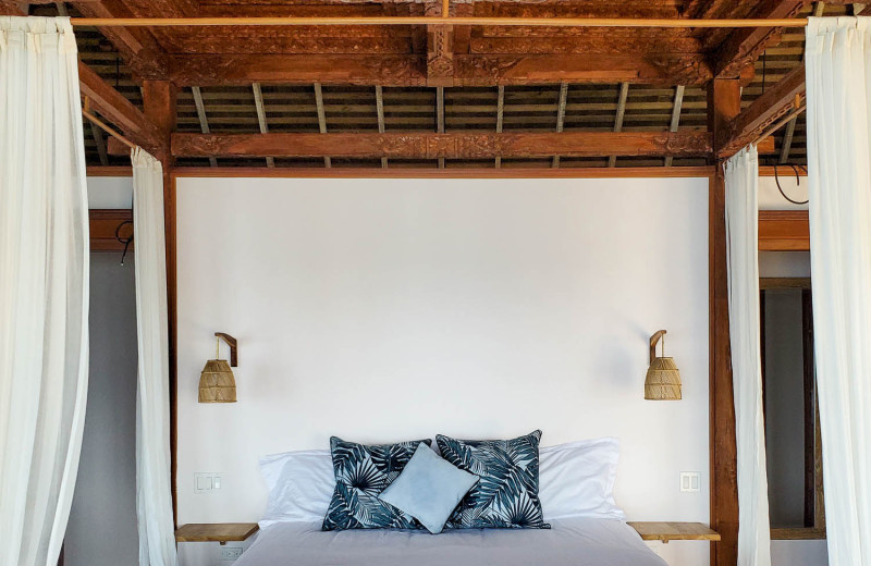 Guest bed at Bocas Bali Resort.