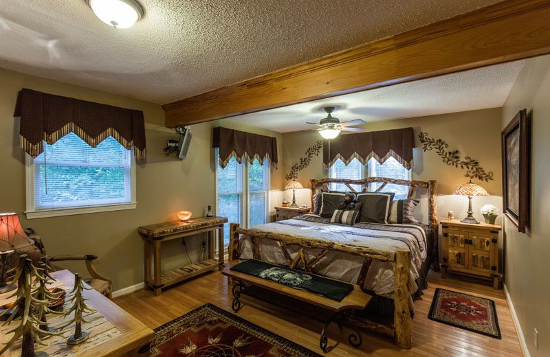Cabin bedroom at Mountain Oasis Cabin Rentals.
