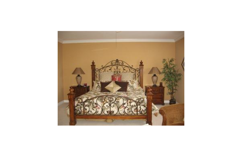 Vacation rental bedroom at Sunshine Resort Rentals, LLC.