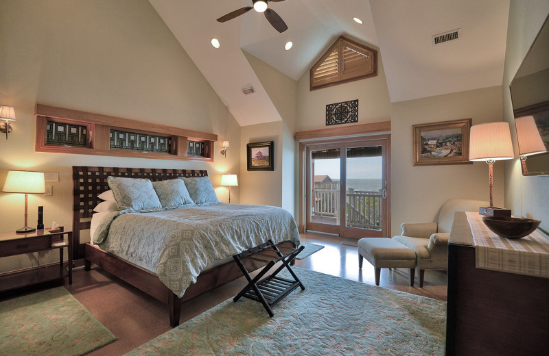 Rental bedroom at Joe Lamb Jr. & Associates Vacation Rentals.
