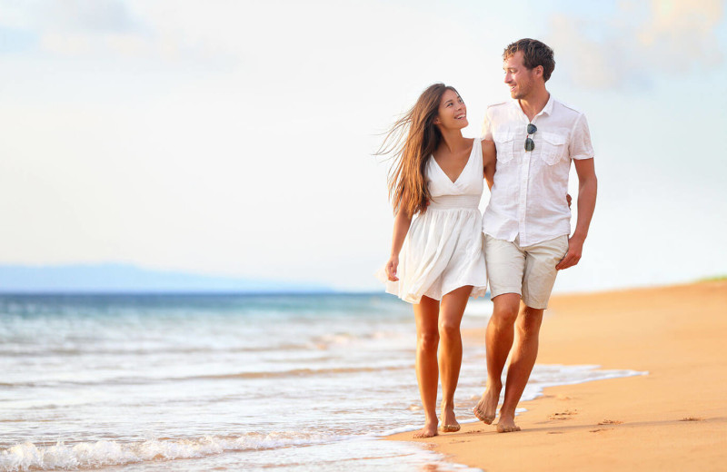 Couple on beach at Carroll Villa.