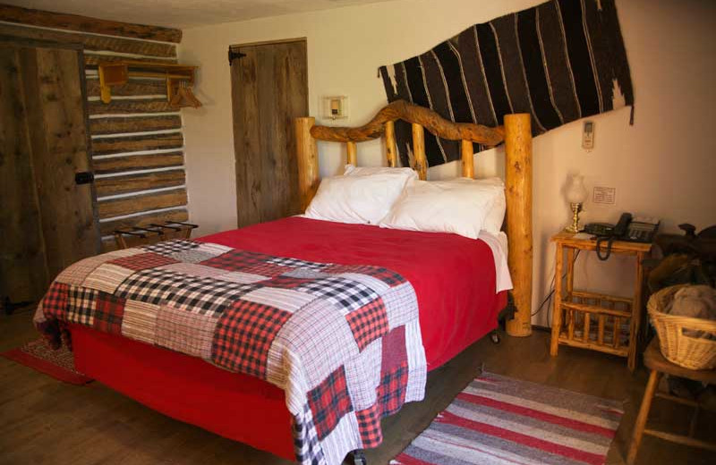 Cabin bedroom at Colorado Cattle Company Ranch.