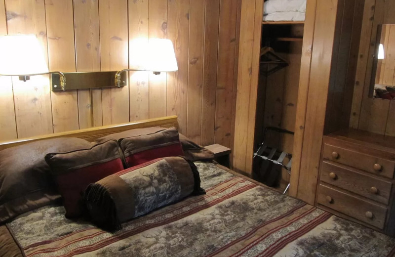 Cabin bedroom at Rain Forest Resort Village.