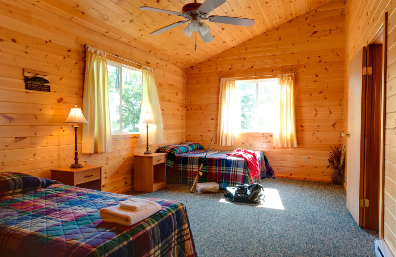 Cabin bedroom at Tetu Island Lodge.