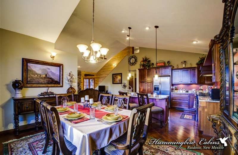 Gourmet kitchen and dining area at Hummingbird Cabins - Pine Cone Cabin Vacation Rental