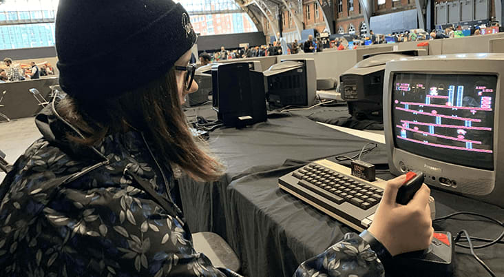 Alex playing an Atari console.