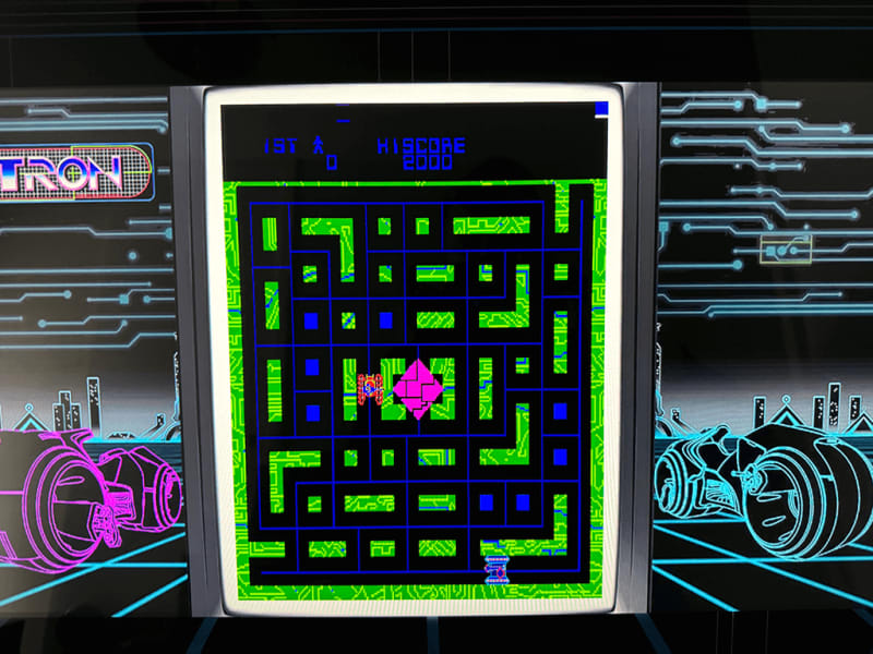 Tron A close up of an arcade playing the Tron arcade game.