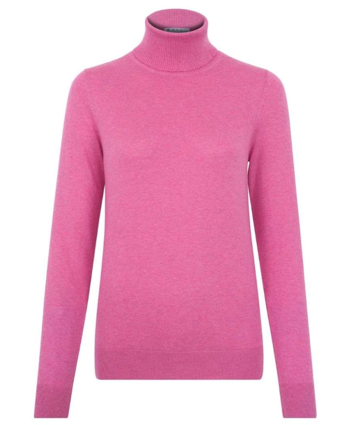 a pink sweater on a mannequin