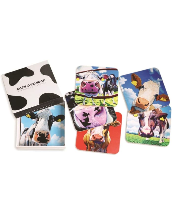 a group of coasters with cows on them