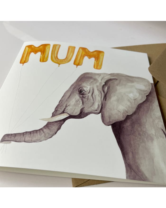 a card with an elephant and balloons