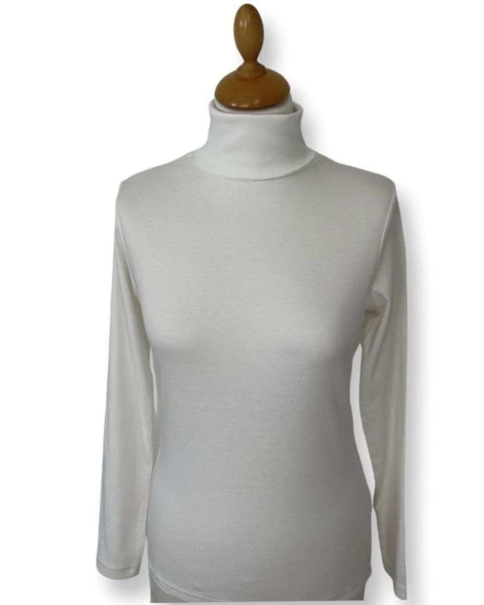 a white turtleneck on a mannequin