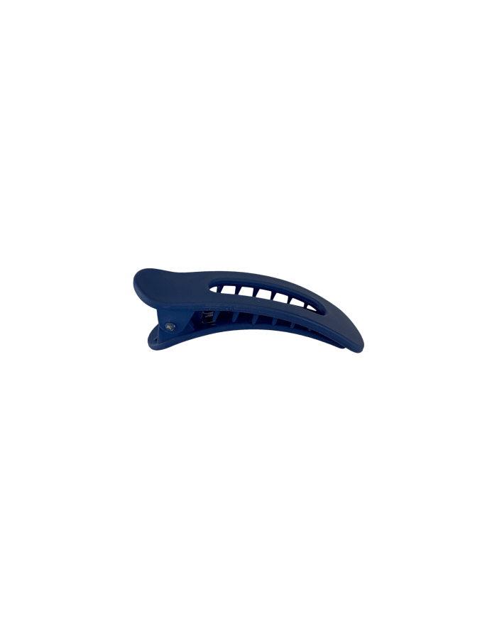 a blue hair clip on a black background