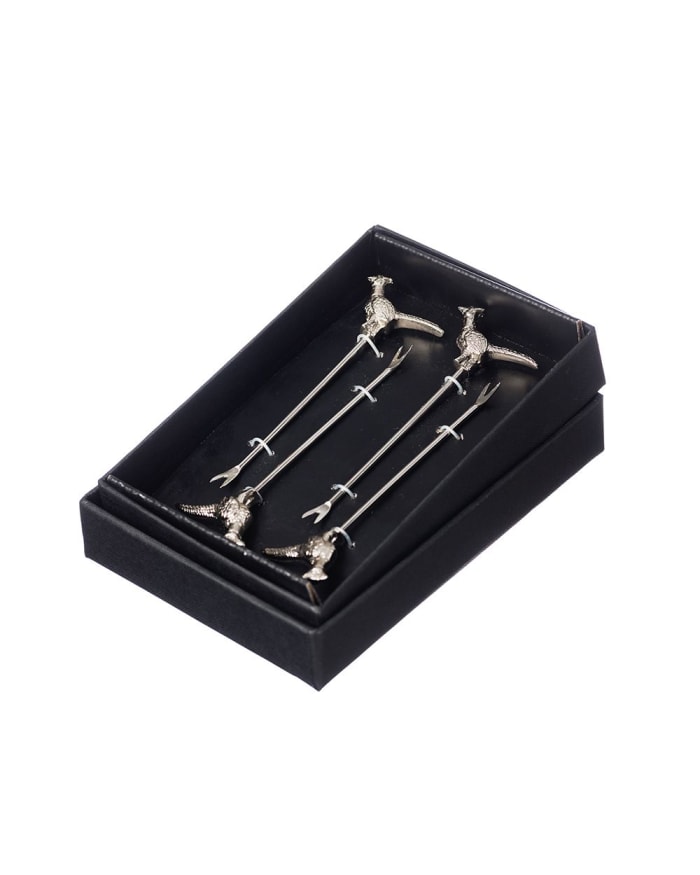 a set of metal objects in a box