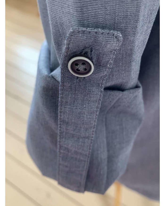 a close up of a button on a shirt