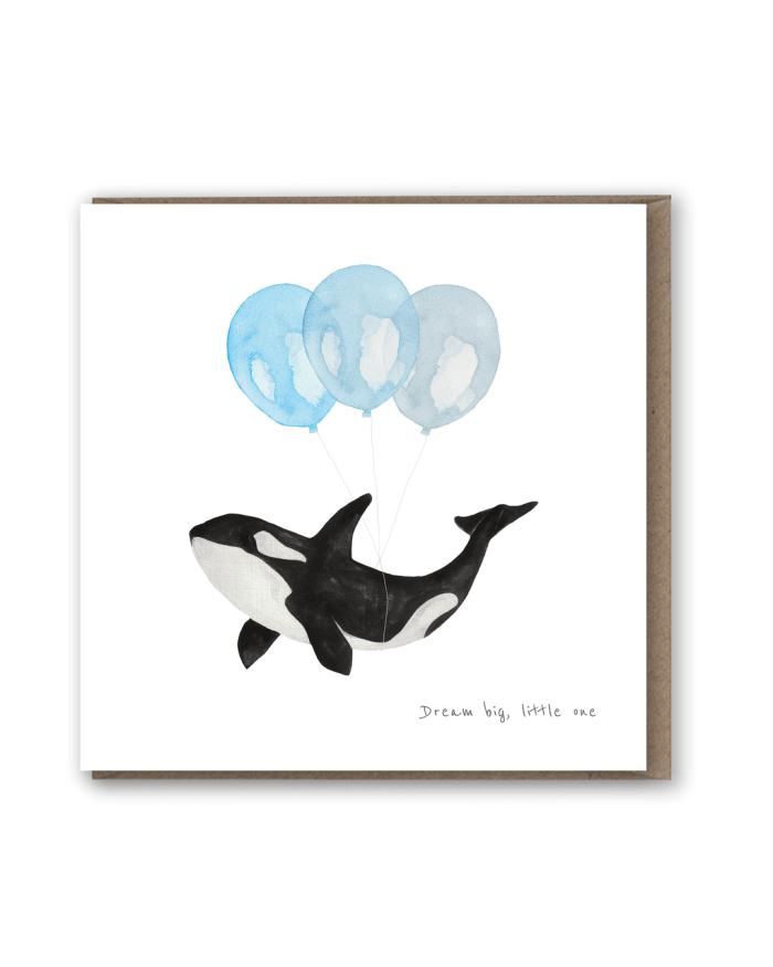 a card with a whale and balloons