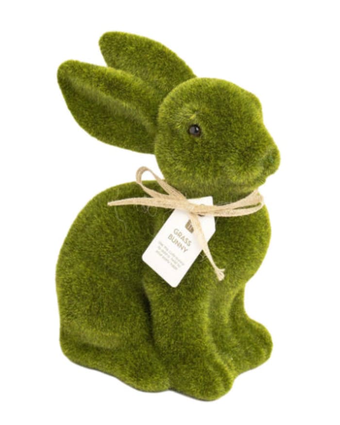 a green bunny with a tag