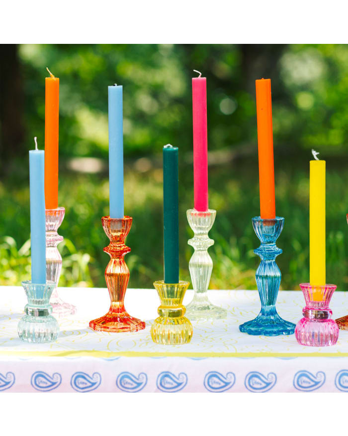 a group of colorful candles on a table