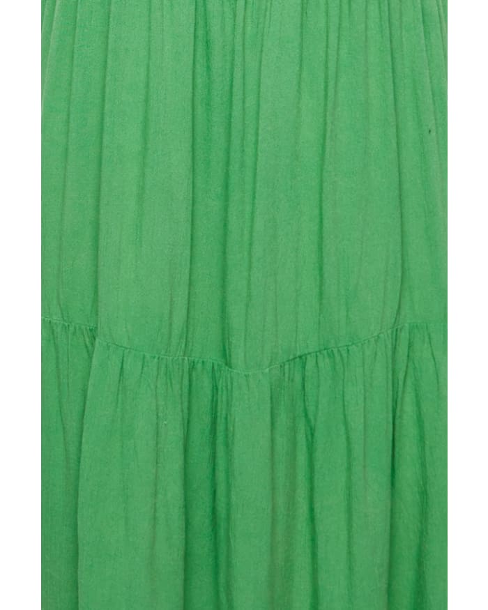 a close up of a green dress