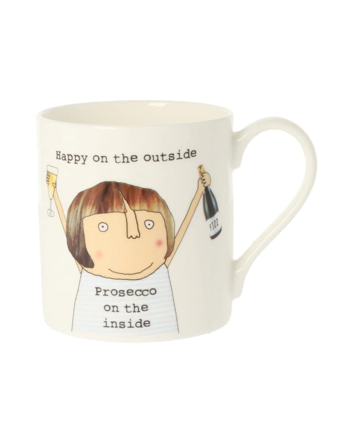 a white mug with a cartoon character on it