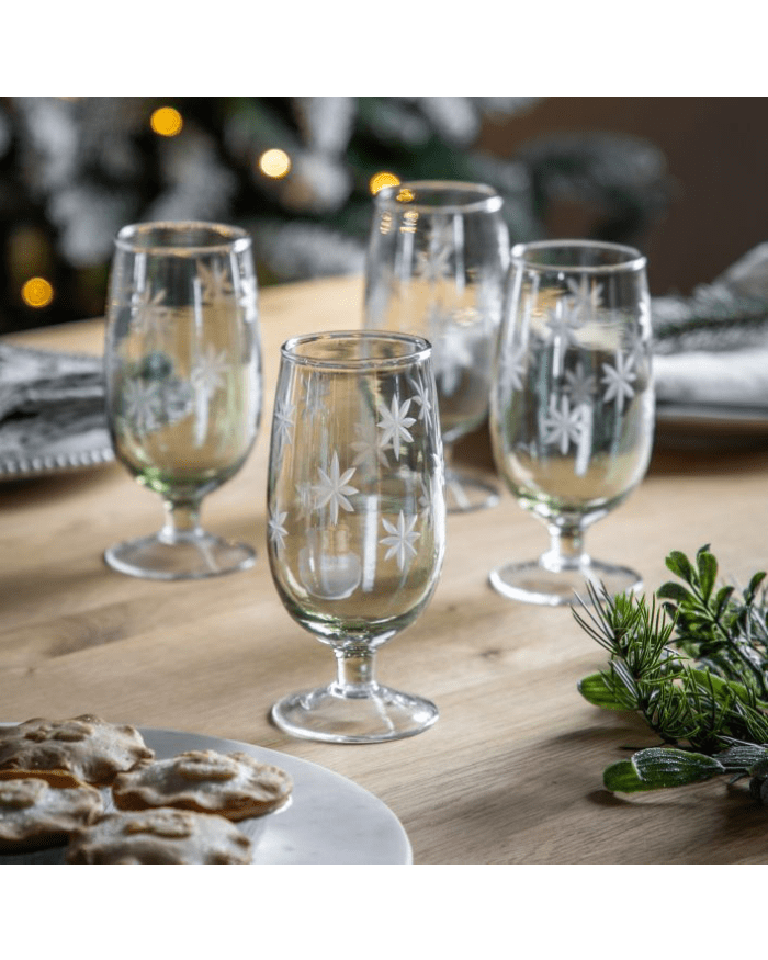 a group of glasses on a table