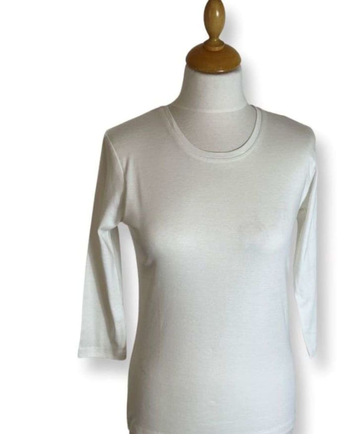 a white shirt on a mannequin