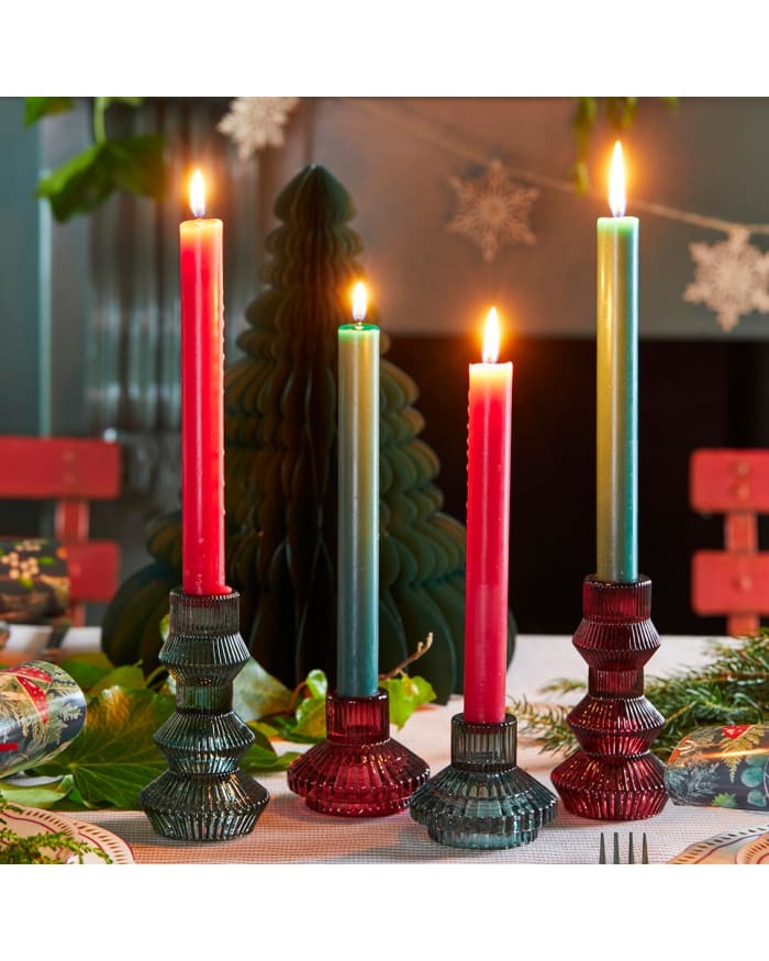 a group of candles on a table