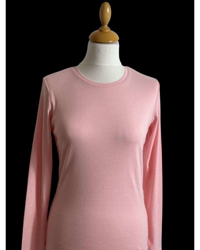 a pink shirt on a mannequin